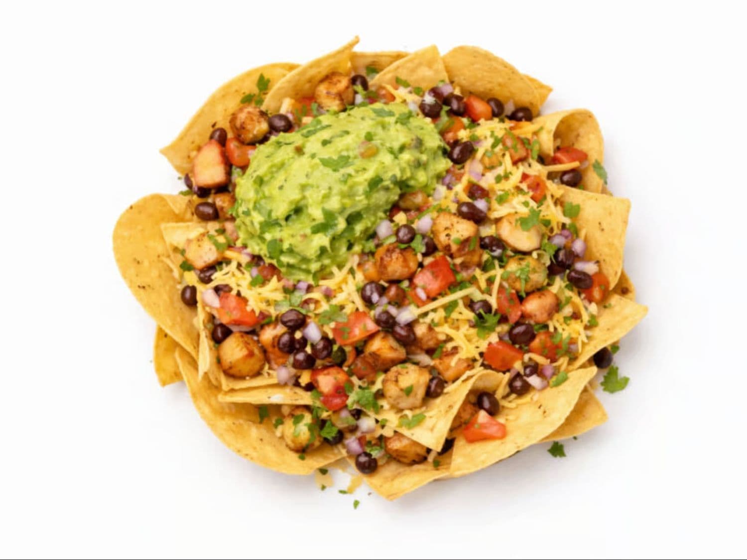 Loaded nachos piled with melted cheese